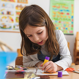 Girl working on a craft project